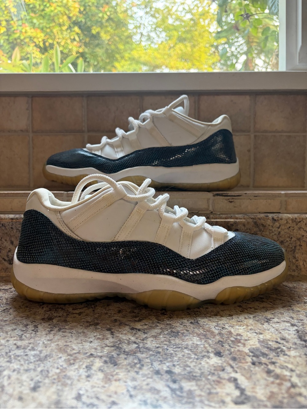 White and Black Low-Top Sneakers